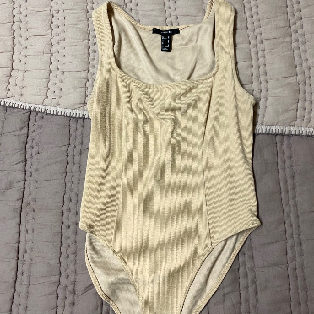 Tan body suit
